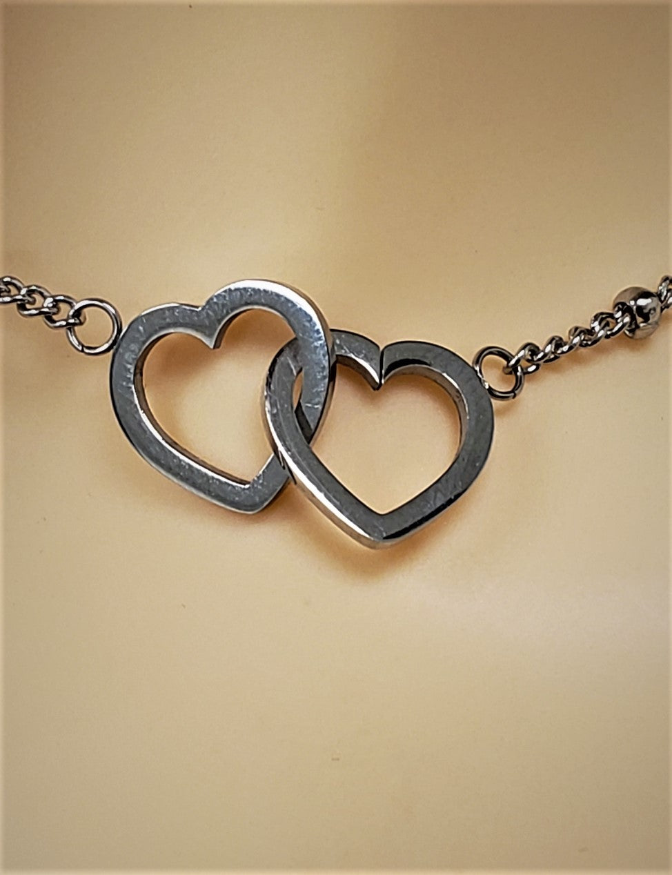 Stainless steel with double hearts - SN 106